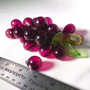 Vintage hollow hard plastic purple grapes, looks like glass